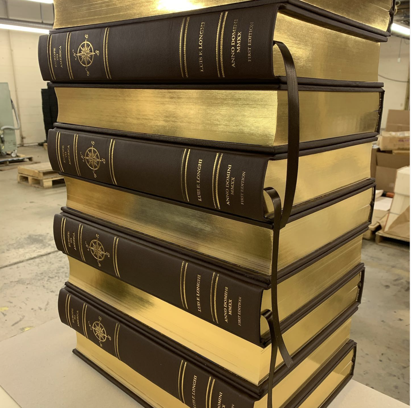 Foil gliding on books manufactured at Bind Tech